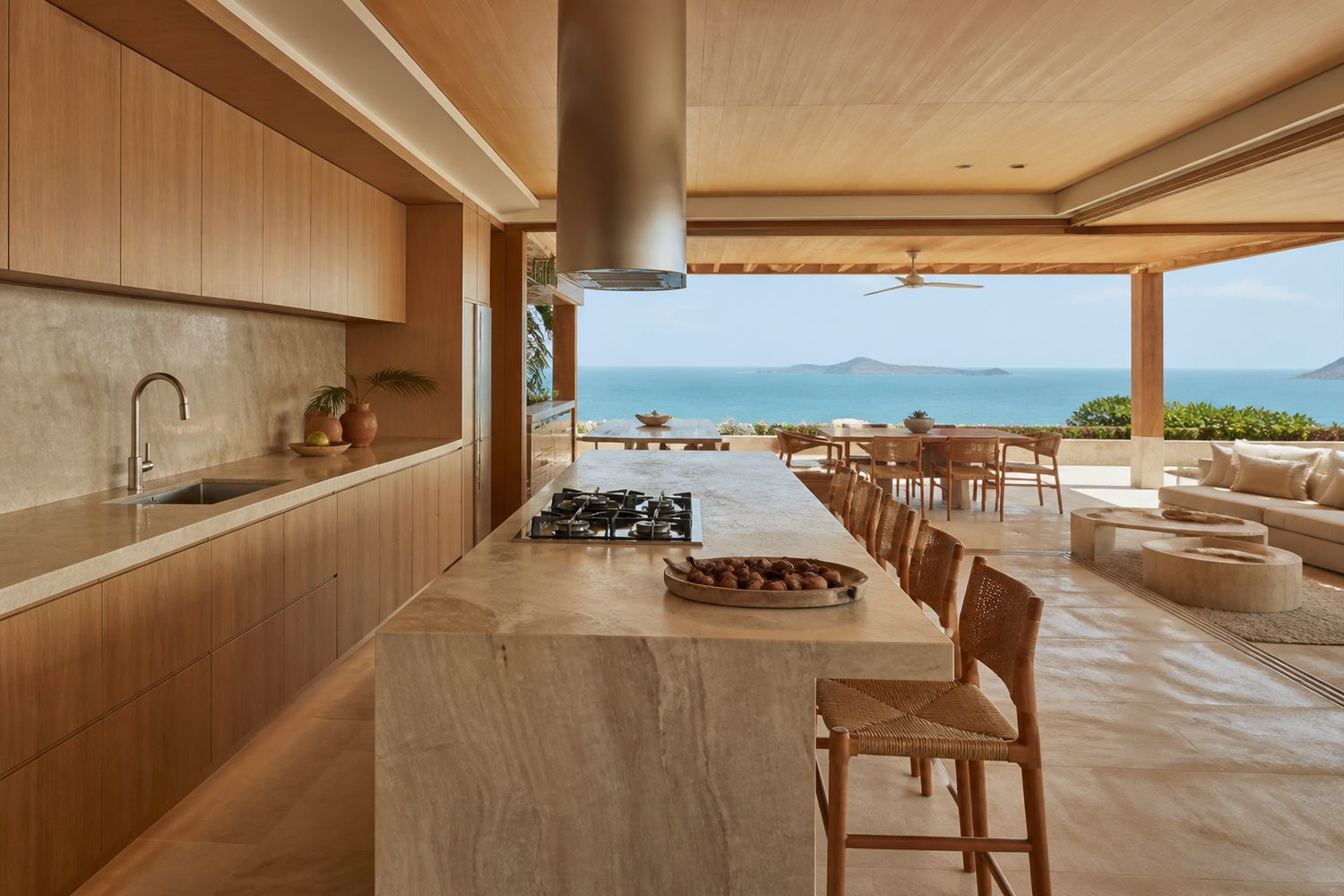 Cozinha integrada com varanda e vista para o mar